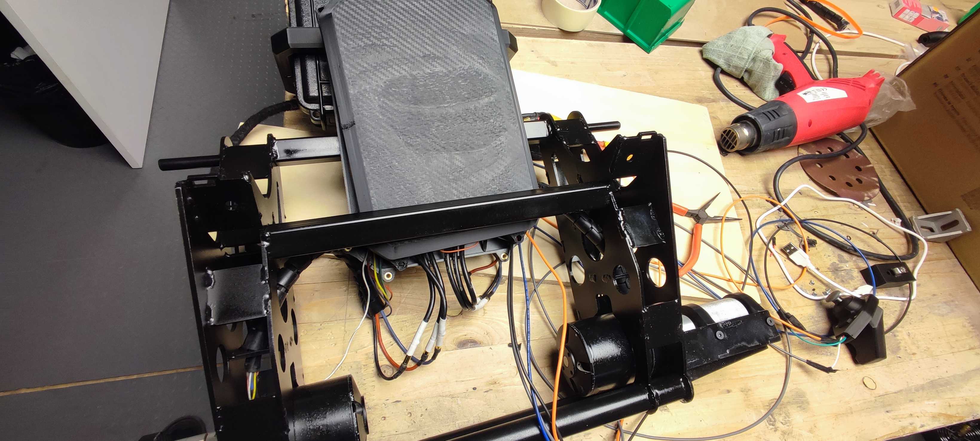Close-up of motor mount with VESC controller box and wiring harness